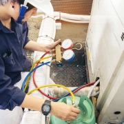 Technician is checking air conditioner
